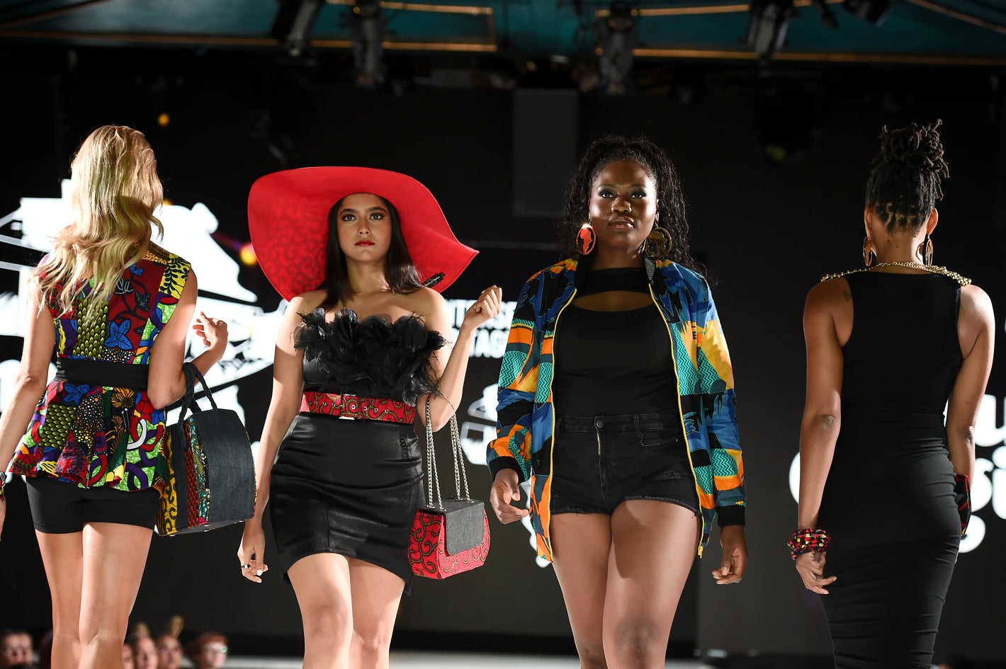 Glam Origins models on NYFW runway. wearing vibrant African print accessories