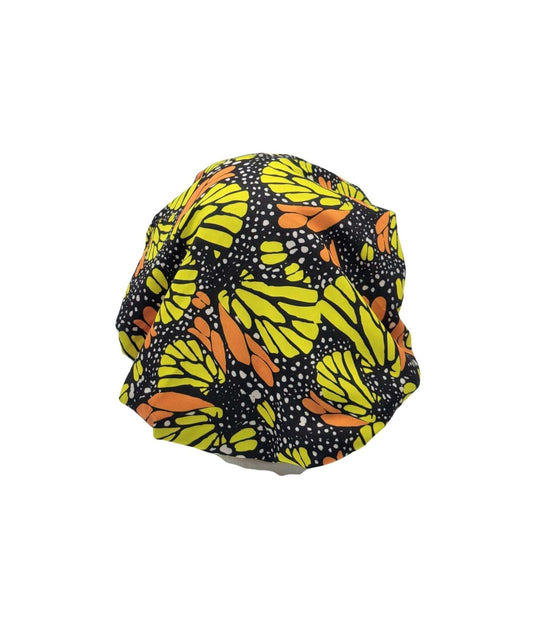 Glam Origins Ankara Print Satin Lined Double Layer Hair Bonnet Hair Bonnets 

Double layer
Outer lining: polyester
Inner lining: satin
Vibrant colors
Large
Strong elastic
Doesn't fall off head while sleeping
Hand wash with similar colors
Mac Ankara Print Satin Lined Double Layer Hair Bonnet