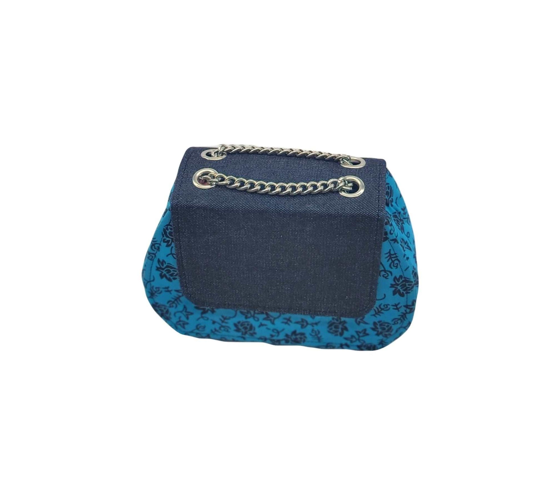 Glam Origins Ummita Chic Ankara Handbags 
Handmade 
Ankara Fabric and Denim
Handbag
Versatile: Can be worn coordinated or separates. 
Bag can be worn as clutch 
Length: 9"
Height: 6" and 10" with straps
Wid Ummita Chic Ankara and Denim Handbag Blue