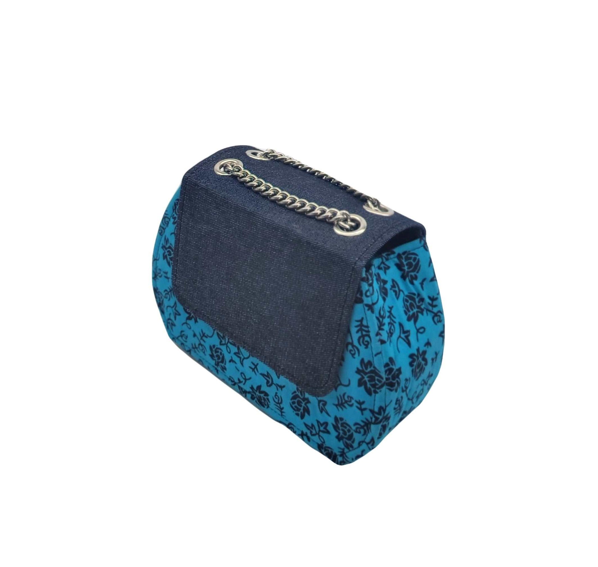 Glam Origins Ummita Chic Ankara Handbags 
Handmade 
Ankara Fabric and Denim
Handbag
Versatile: Can be worn coordinated or separates. 
Bag can be worn as clutch 
Length: 9"
Height: 6" and 10" with straps
Wid Ummita Chic Ankara and Denim Handbag Blue