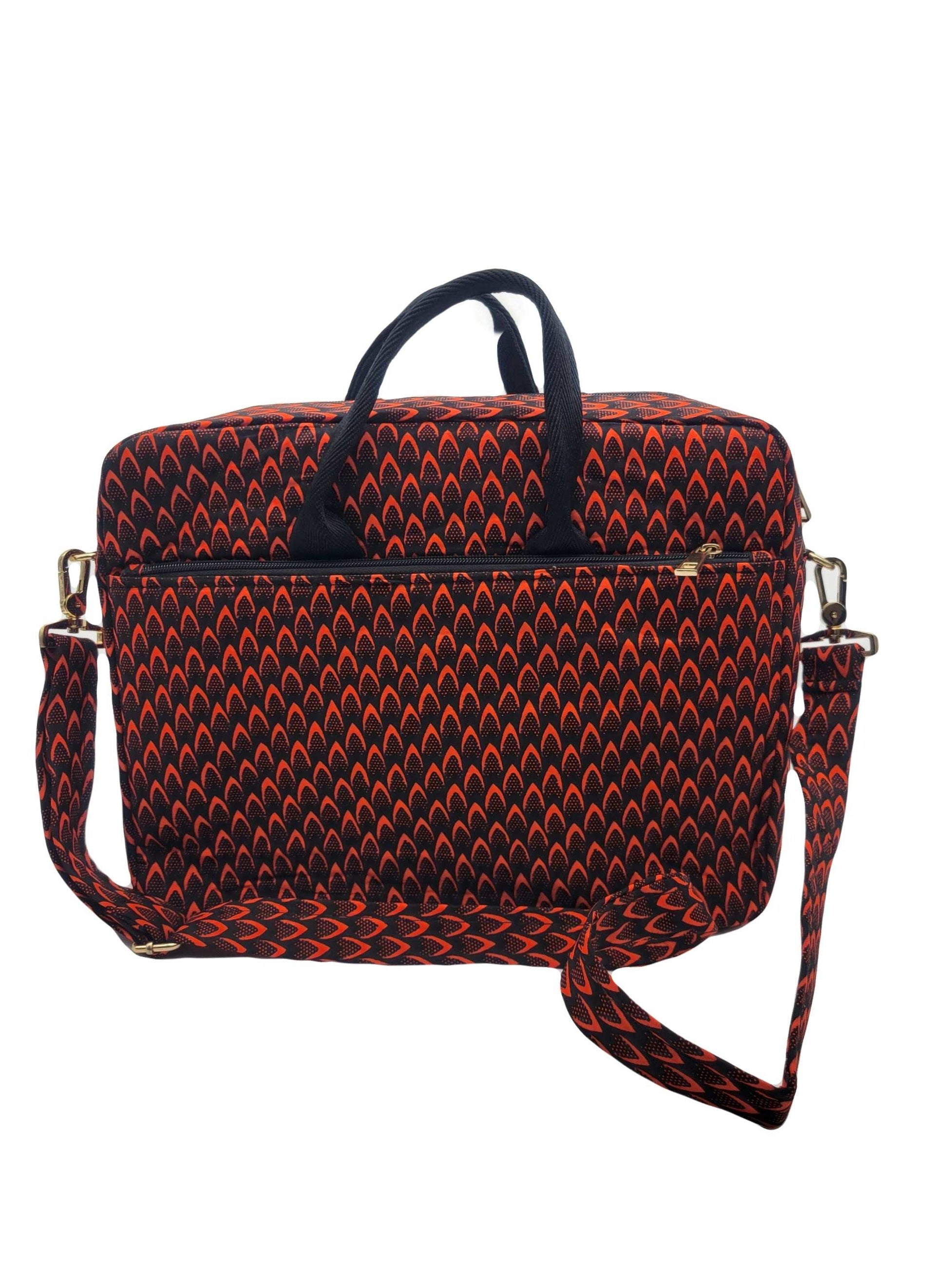 Glam Origins Laptop Bag Red  Ankara/Kente 
Fabric known as "Fish scales"
13" or 12"
Handle and Ankara shoulder strap
Do not bleach
Spot Clean 
Made in Nigeria Laptop Bag Red