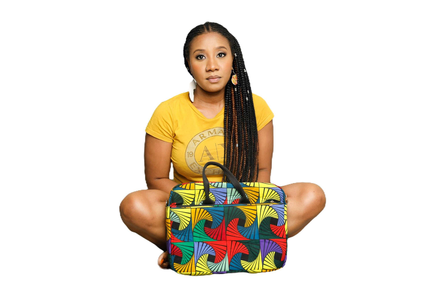 Glam Origins Laptop Bag Laptop bags Ankara/Kente 
13" or 12"
Handle and Ankara shoulder strap
Do not bleach
Spot Clean 
Made in Nigeria Laptop Bag