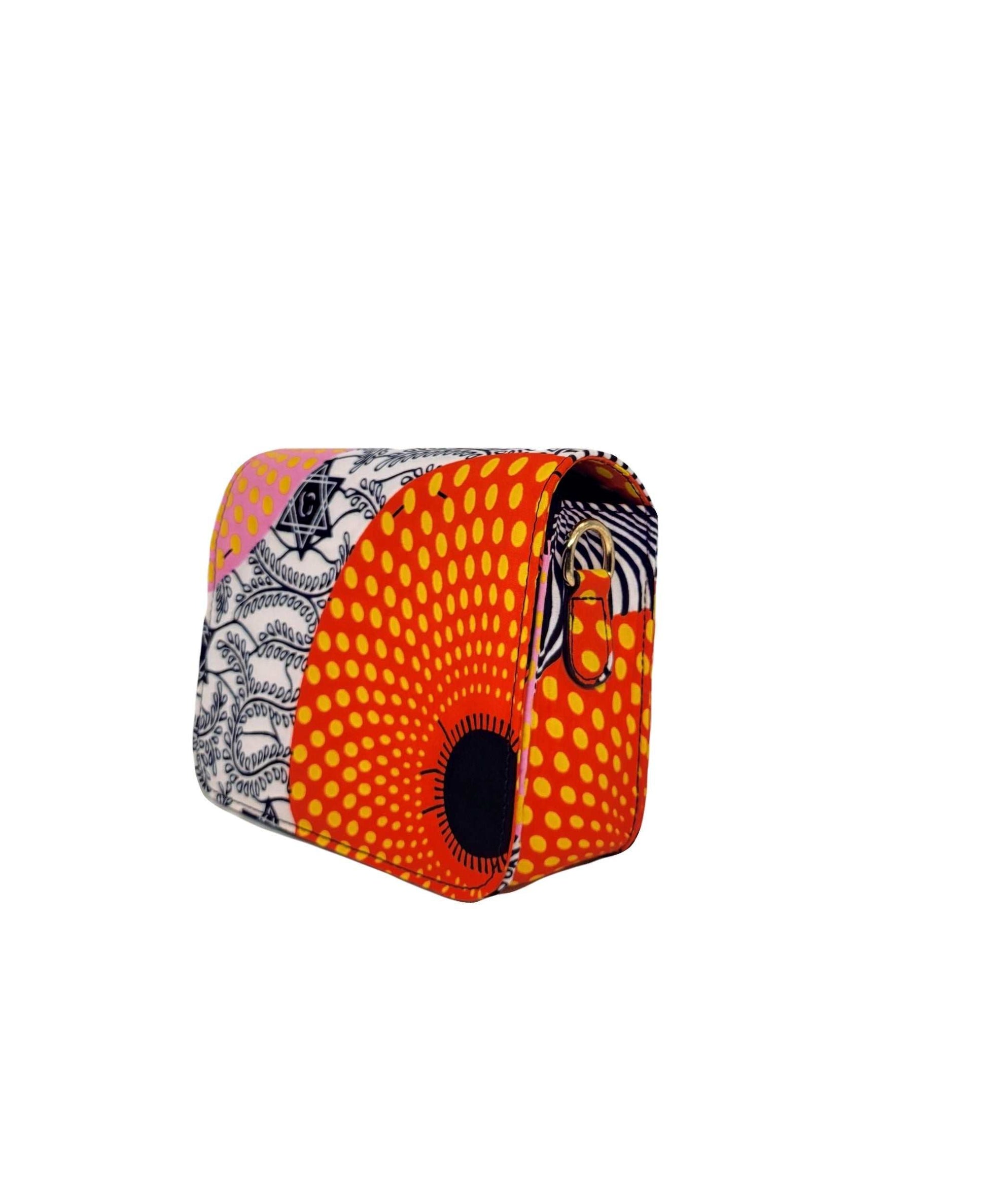 Glam Origins Lili Ankara Mini Clutch bag Handbags 
Handmade
Ankara
Vibrant Colors
Can be used as clutch or Chain handbag
Spot Clean
Do not bleach
Made in China
 Lili Ankara Mini Clutch bag