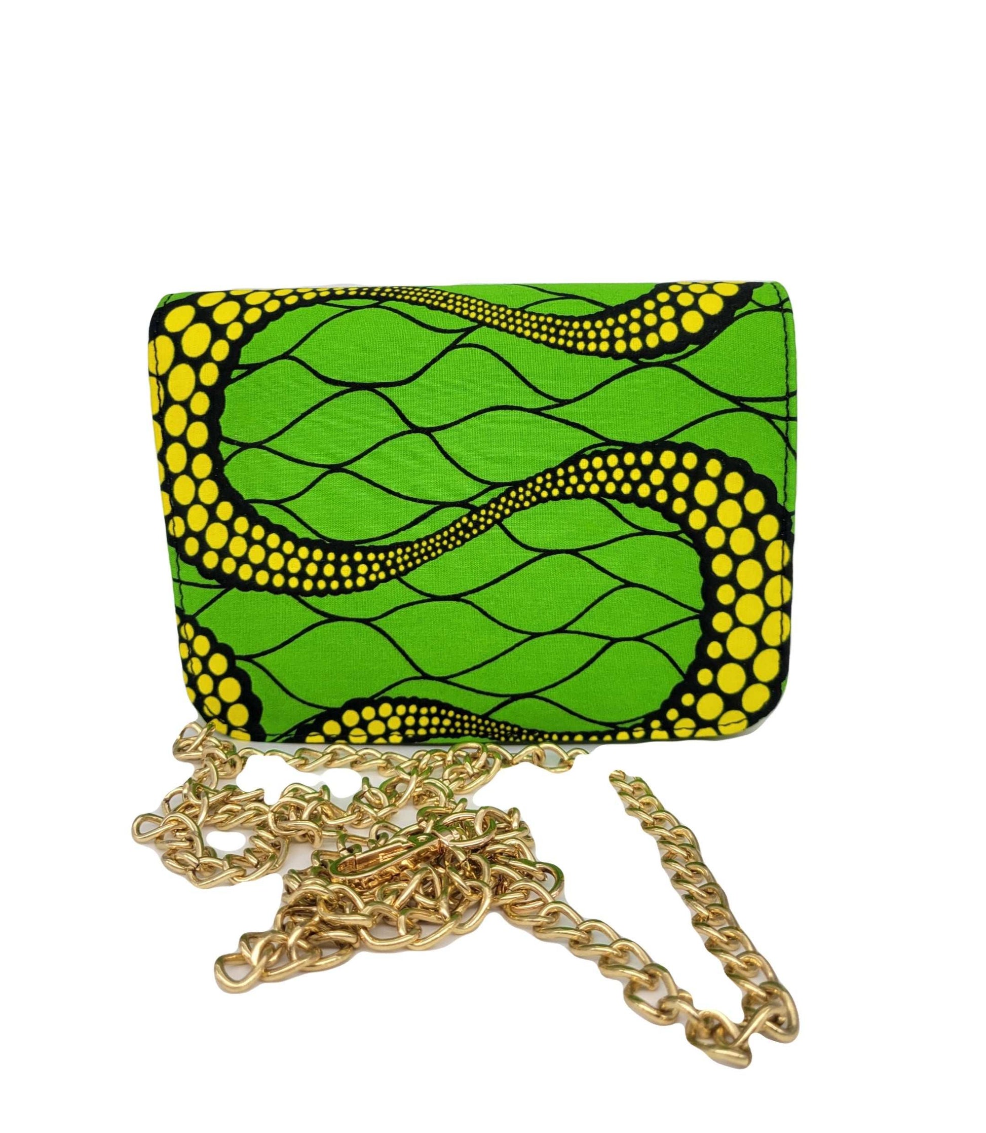 Glam Origins Lili Ankara Mini Clutch bag Handbags 
Handmade
Ankara
Vibrant Colors
Can be used as clutch or Chain handbag
Spot Clean
Do not bleach
Made in China
 Lili Ankara Mini Clutch bag