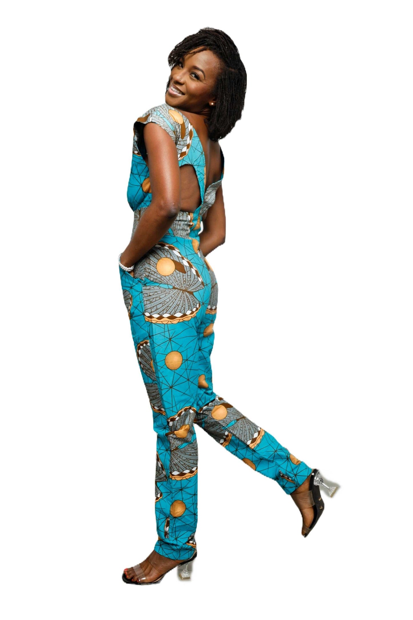 Glam Origins Manji Jumpsuit Jumpsuits 	Ankara 	100% cotton	Measurement: L	Light lining	Vibrant Colors	Stylish	True to roots	Best dry clean	Accessories not included	Made in Nigeria
 Manji Jumpsuit