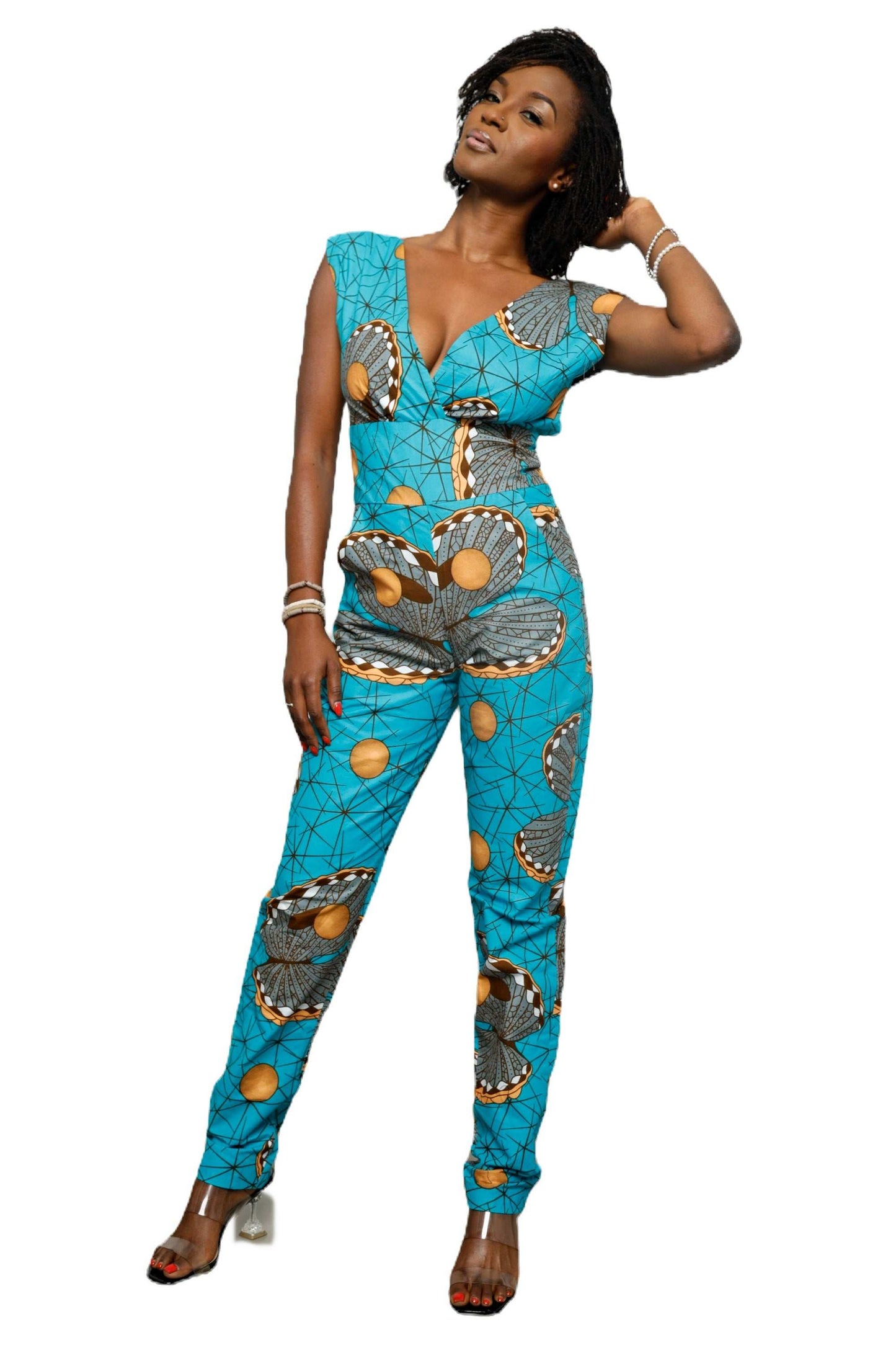 Glam Origins Manji Jumpsuit Jumpsuits 	Ankara 	100% cotton	Measurement: L	Light lining	Vibrant Colors	Stylish	True to roots	Best dry clean	Accessories not included	Made in Nigeria
 Manji Jumpsuit