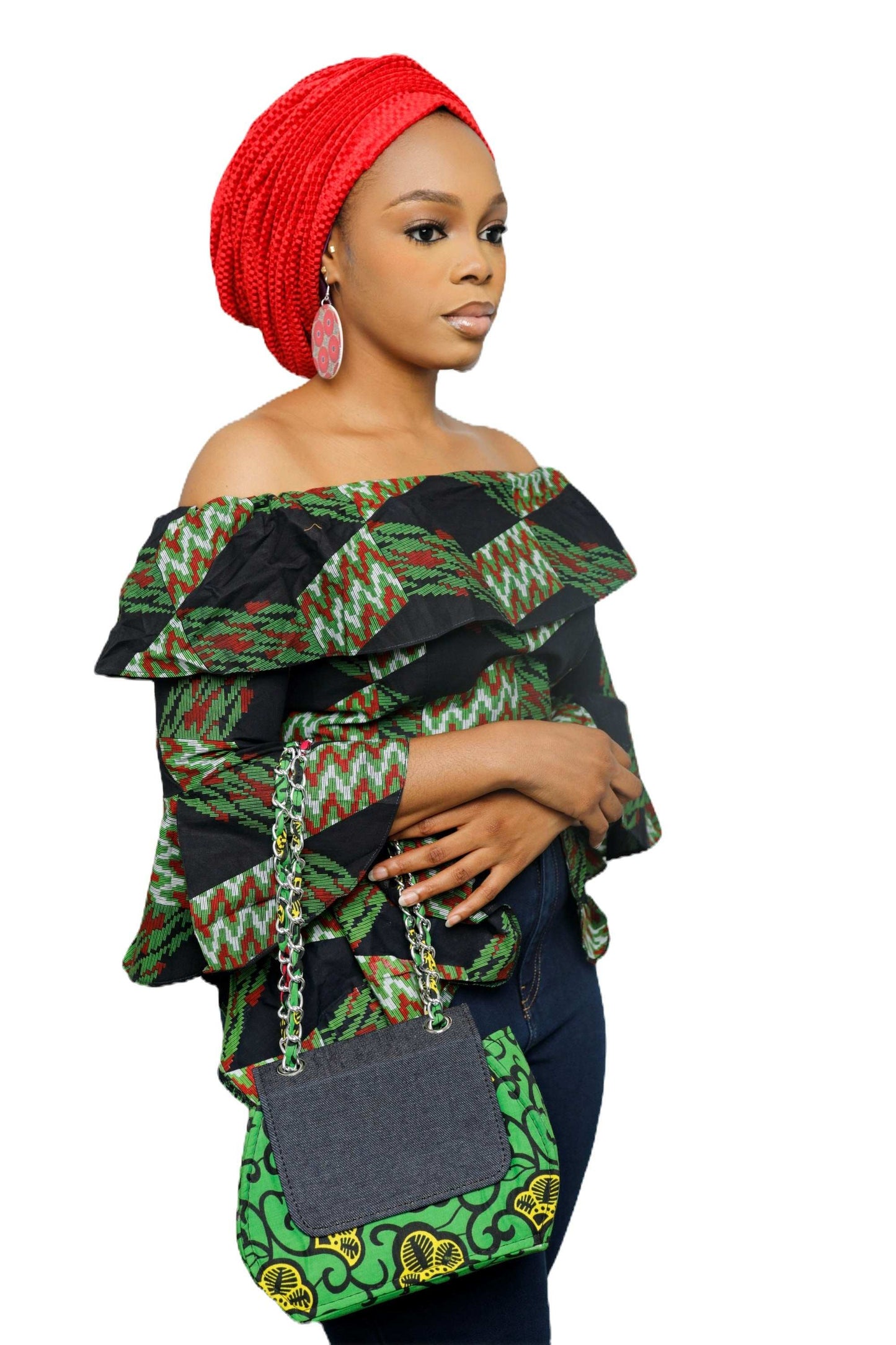 Glam Origins Ummita ChicAnkara Handbags 	Handmade 	Ankara Fabric and Denim	Handbag	Versatile: Can be worn coordinated or separates. 	Bag can be worn as clutch or cross-body	Length: 9"	Height: 6" and 10" wi Ummita ChicAnkara and Denim Handbag