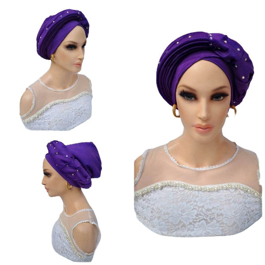 Glam Origins Meena embellished purple silk turban Turbans 	Handmade silk turbans	Adjust to fit	Vibrant Colors	Stylish	True to roots	Spot clean	Best dry clean	Made in Nigeria
 Meena embellished purple silk turban